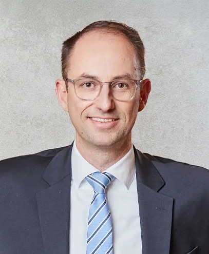 Portraitfoto von Dr. Jens Schmidt